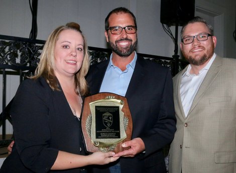 Lemoore Chamber Executive Director Amy Ward with Kings County Farm Bureau's Monty Hoggard (president) and Executive Director Dusty Ference.